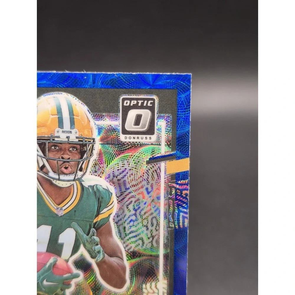 2023 Donruss Optic Jayden Reed #334 Rated Rookie Blue Scope Prizm SP Green Bay